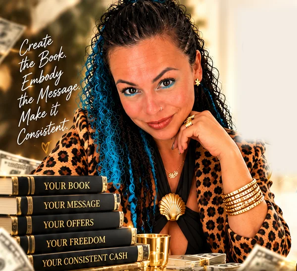 Dasha in leopard print beside books titled Your Book, Your Message, Your Offers, Your Freedom, Your Consistent Cash